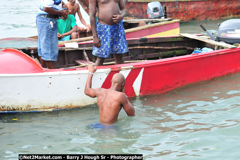 Lucea Cross the Harbour @ Lucea Car Park - All Day Event - Cross the Harbour Swim, Boat Rides, and Entertainment for the Family - Concert Featuring: Bushman, George Nooksl, Little Hero, Bushi One String, Dog Rice and many local Artists - Friday, August 1, 2008 - Lucea, Hanover Jamaica - Photographs by Net2Market.com - Barry J. Hough Sr. Photojournalist/Photograper - Photographs taken with a Nikon D300 - Negril Travel Guide, Negril Jamaica WI - http://www.negriltravelguide.com - info@negriltravelguide.com...!