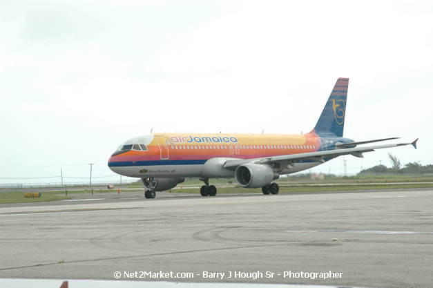 Air Jamaica Airline - Landing & Take Off - MBJ Airports Limited - Sangster International Airport - Domestic Terminal - Montego Bay, St James, Jamaica W.I. - MBJ Limited - Transforming Sangster International Airport into a world class facility - Photographs by Net2Market.com - Negril Travel Guide, Negril Jamaica WI - http://www.negriltravelguide.com - info@negriltravelguide.com...!