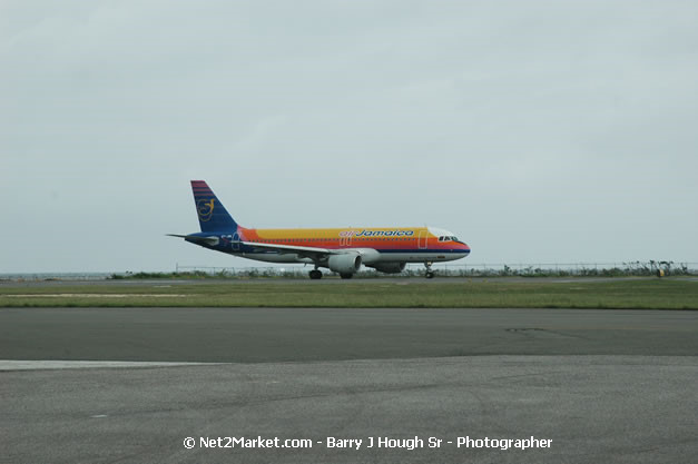 Air Jamaica Airline - Landing & Take Off - MBJ Airports Limited - Sangster International Airport - Domestic Terminal - Montego Bay, St James, Jamaica W.I. - MBJ Limited - Transforming Sangster International Airport into a world class facility - Photographs by Net2Market.com - Negril Travel Guide, Negril Jamaica WI - http://www.negriltravelguide.com - info@negriltravelguide.com...!