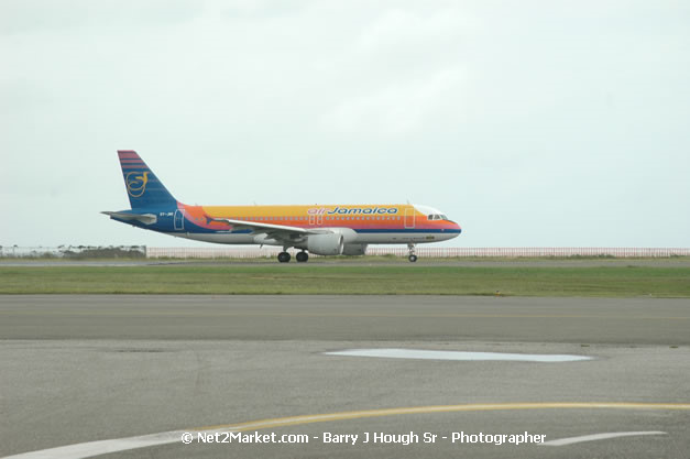 Air Jamaica Airline - Landing & Take Off - MBJ Airports Limited - Sangster International Airport - Domestic Terminal - Montego Bay, St James, Jamaica W.I. - MBJ Limited - Transforming Sangster International Airport into a world class facility - Photographs by Net2Market.com - Negril Travel Guide, Negril Jamaica WI - http://www.negriltravelguide.com - info@negriltravelguide.com...!