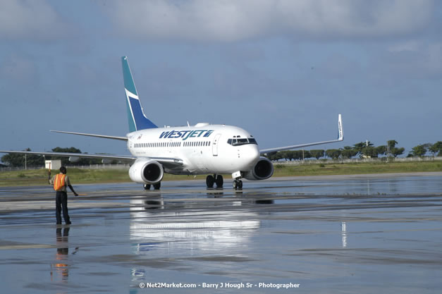 MBJ Airports Limited Welcomes WestJet Airlines - Inaugural Scheduled Service From Toronto Pearsons International Airport - Monday, December 10, 2007 - Sangster International Airport - MBJ Airports Limited, Montego Bay, Jamaica W.I. - Photographs by Net2Market.com - Barry J. Hough Sr, Photographer - Negril Travel Guide, Negril Jamaica WI - http://www.negriltravelguide.com - info@negriltravelguide.com...!