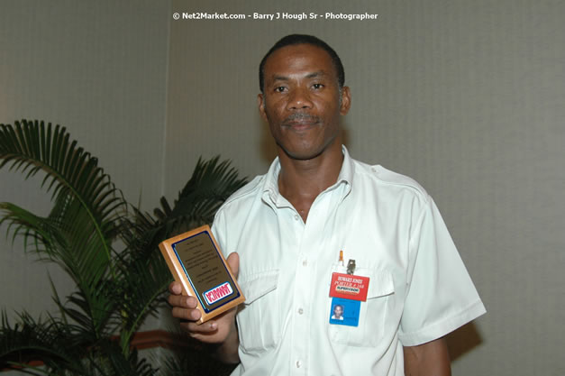 Red Cap Porters Awards - Minister of Tourism, Hon. Edmund Bartlett - Director of Tourism, Basil Smith - Friday, December 14, 2007 - Holiday Inn Sunspree, Montego Bay, Jamaica W.I. - Photographs by Net2Market.com - Barry J. Hough Sr, Photographer - Negril Travel Guide, Negril Jamaica WI - http://www.negriltravelguide.com - info@negriltravelguide.com...!