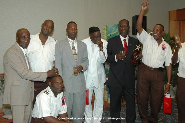 Red Cap Porters Awards - Minister of Tourism, Hon. Edmund Bartlett - Director of Tourism, Basil Smith - Friday, December 14, 2007 - Holiday Inn Sunspree, Montego Bay, Jamaica W.I. - Photographs by Net2Market.com - Barry J. Hough Sr, Photographer - Negril Travel Guide, Negril Jamaica WI - http://www.negriltravelguide.com - info@negriltravelguide.com...!