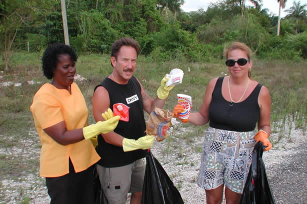 Volunteers Clean-Up Roadside Entrance to Negril - Negril Travel Guide