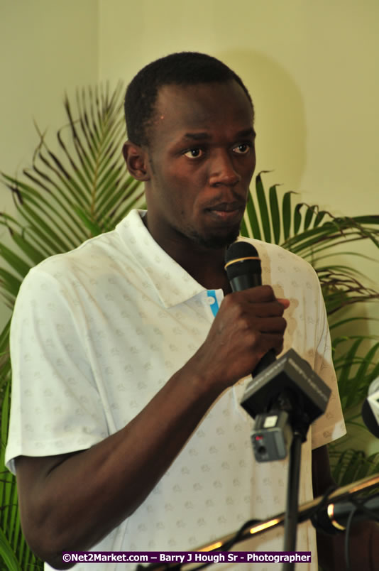 Usain Bolt of Jamaica - The Fastest Man In The World  - Usain Bolt Homecoming Celebrations - Press Conference at the Grand Bahia Principe &amp; Sherwood Content - Waldensia Primary School - Photographs by Net2Market.com - Barry J. Hough Sr. Photojournalist/Photograper - Photographs taken with a Nikon D300 - Negril Travel Guide, Negril Jamaica WI - http://www.negriltravelguide.com - info@negriltravelguide.com...!