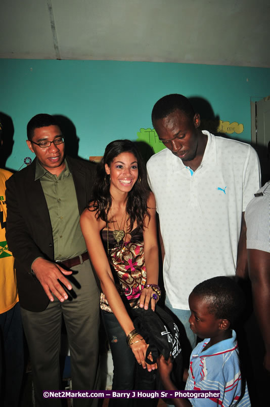 Usain Bolt of Jamaica - The Fastest Man In The World  - Usain Bolt Homecoming Celebrations - Press Conference at the Grand Bahia Principe &amp; Sherwood Content - Waldensia Primary School - Photographs by Net2Market.com - Barry J. Hough Sr. Photojournalist/Photograper - Photographs taken with a Nikon D300 - Negril Travel Guide, Negril Jamaica WI - http://www.negriltravelguide.com - info@negriltravelguide.com...!